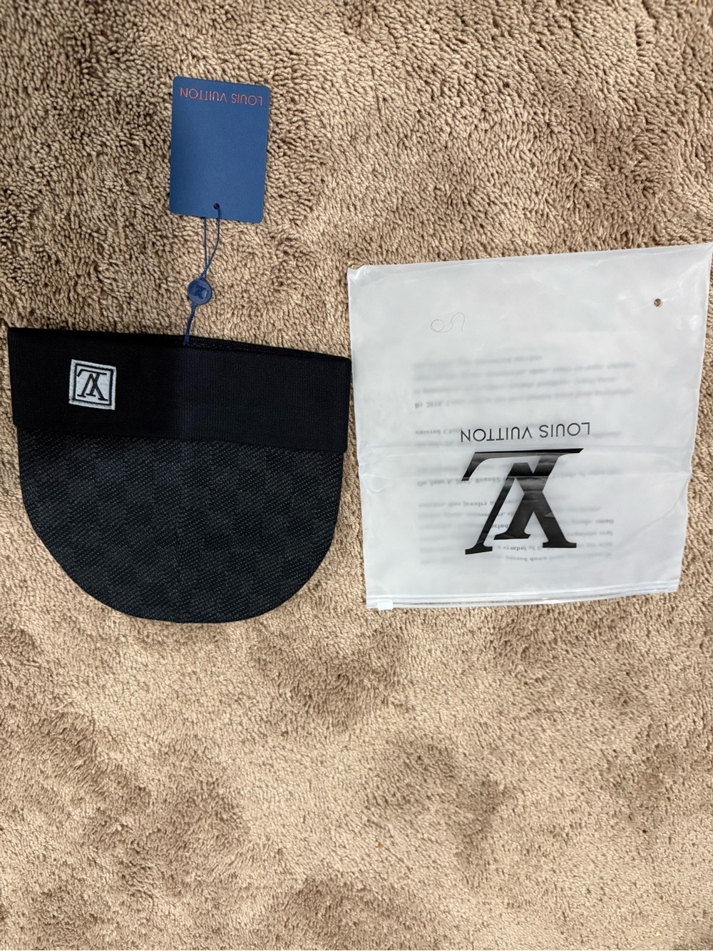 Louis Vuitton Navy Blue and Gold Hat Tag Detail